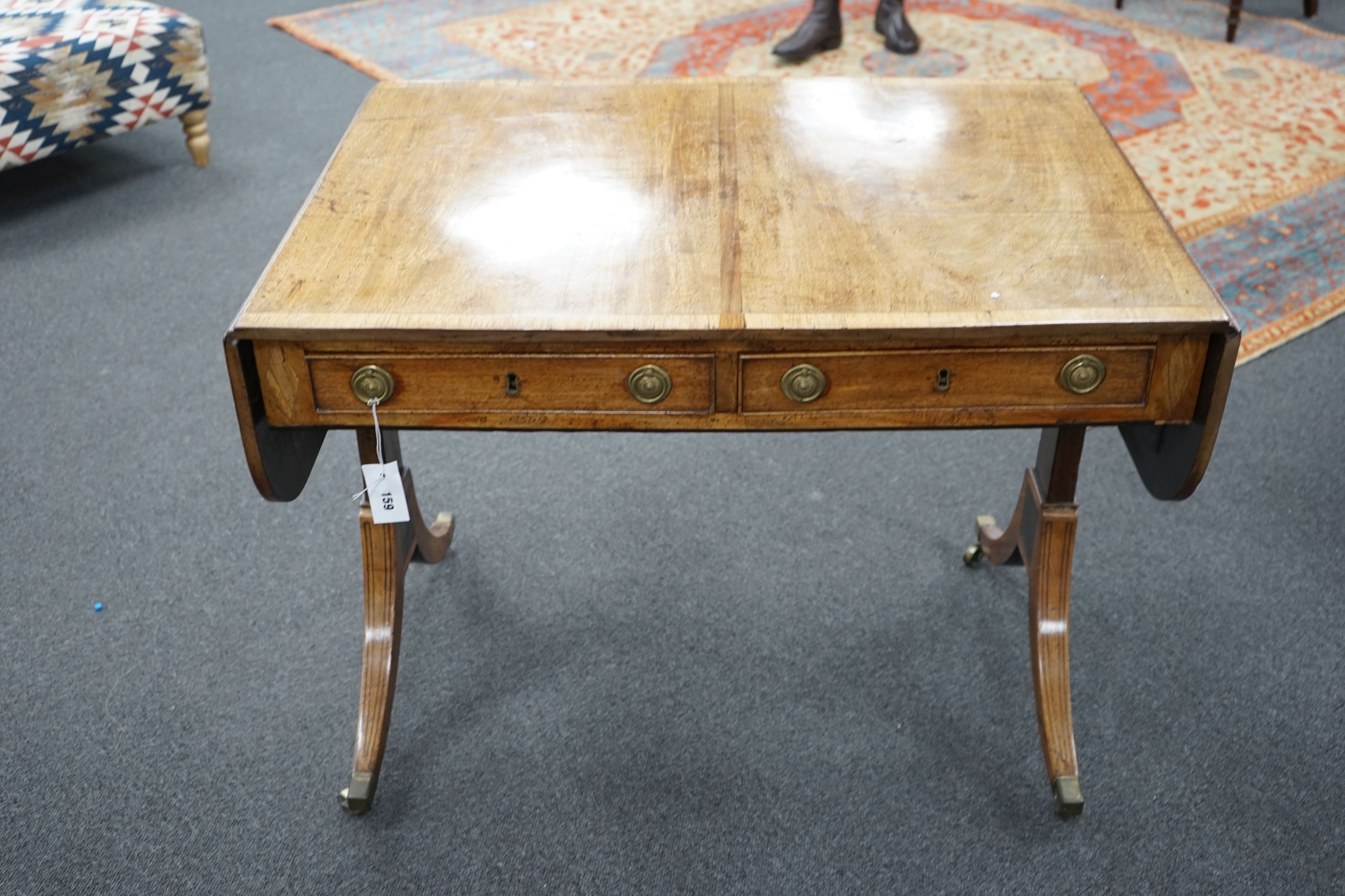 A Regency rosewood banded mahogany sofa table, width 91cm, depth 65cm, height 70cm